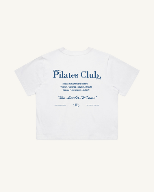 White t-shirt with 'Pilates Club' text on a white background